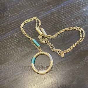 Park Lane hammered gold circle pendant with thread accents